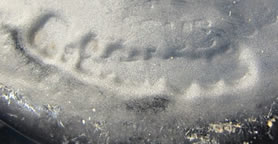 Archers Vase Signature On A Fake Modern Copy In Blue Glass Of An Original Rene Lalique Design Archers Vase Signature On A Fake Modern Copy In Blue Glass Of An Original Rene Lalique Design