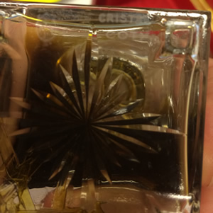 La Jacee Bottle Close Copy Made By Coty of the Rene Lalique Original Showing The Underside Decoration And Cristal Coty Signature La Jacee Bottle Close Copy Made By Coty of the Rene Lalique Original Showing The Underside Decoration And Cristal Coty Signature