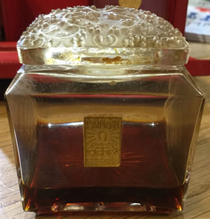 La Jacee Bottle Close Copy Made By Coty of the Rene Lalique Original Labeled For The Fragrance L'Aimant La Jacee Bottle Close Copy Made By Coty of the Rene Lalique Original Labeled For The Fragrance L'Aimant