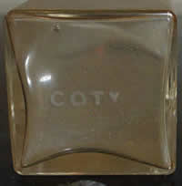 The Underside And Signature On A Coty Eau De Toilette Perfume Bottle Made By Coty Glassworks That Is A Copy Of The Rene Lalique Design The Underside And Signature On A Coty Eau De Toilette Perfume Bottle Made By Coty Glassworks That Is A Copy Of The Rene Lalique Design