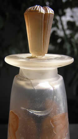 Rene Lalique Ambre Antique Perfume Bottle Close-Up Showing Crack